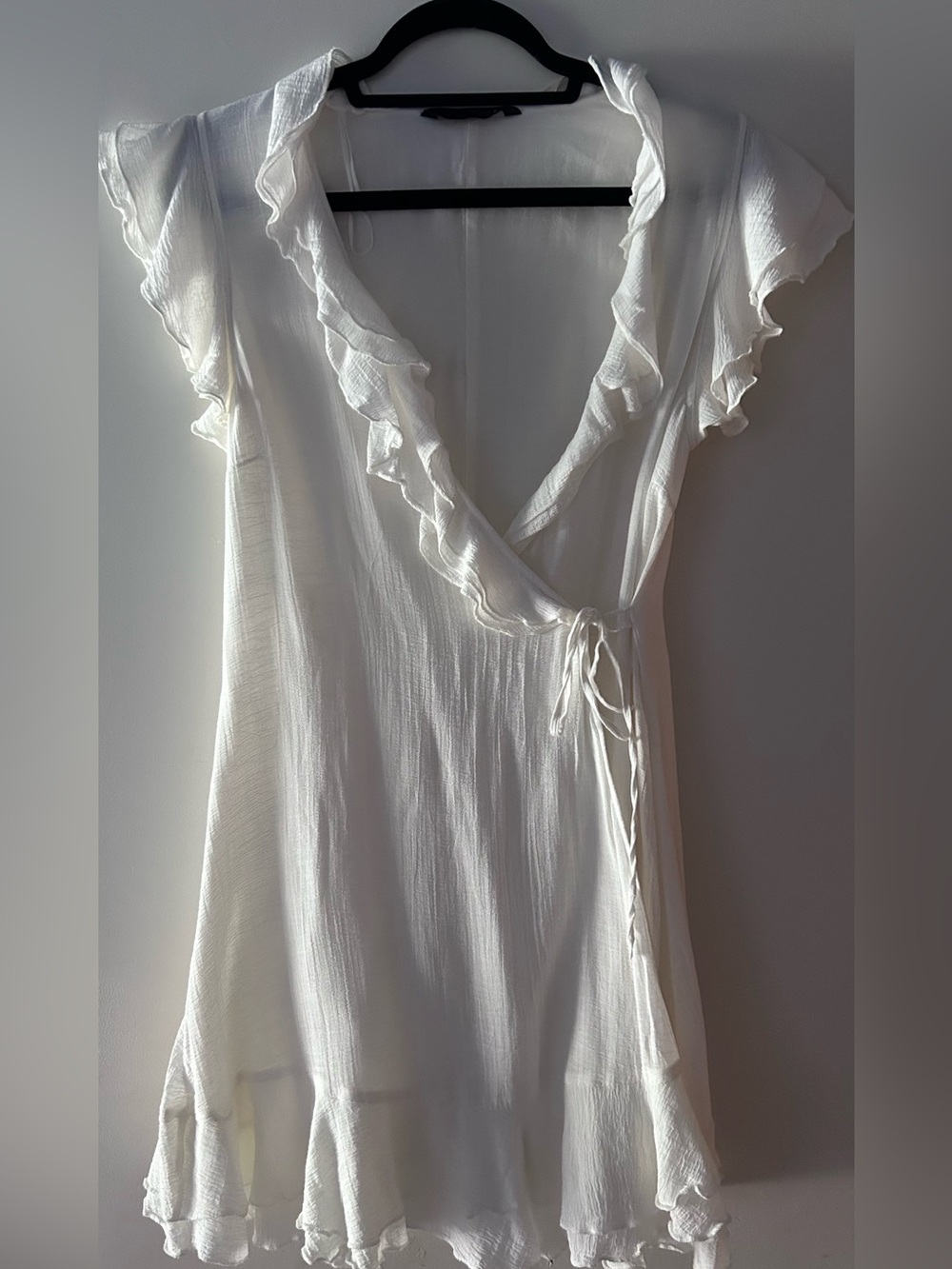 White ruffle wrap mini dress